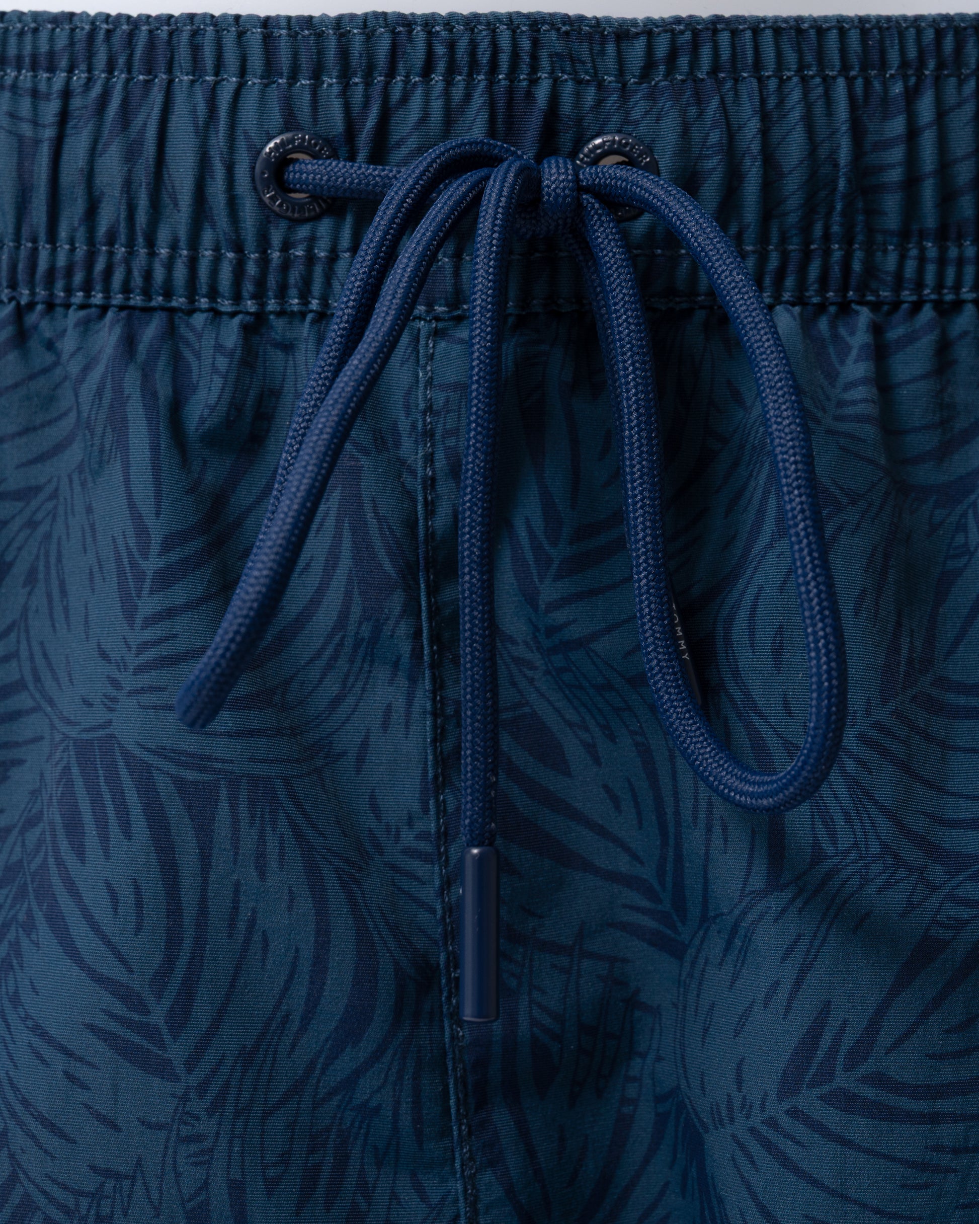close up of of Tommy Hilfiger Print Mens Drawstring Swimming Shorts in  Palm Leaf Aegean Sea