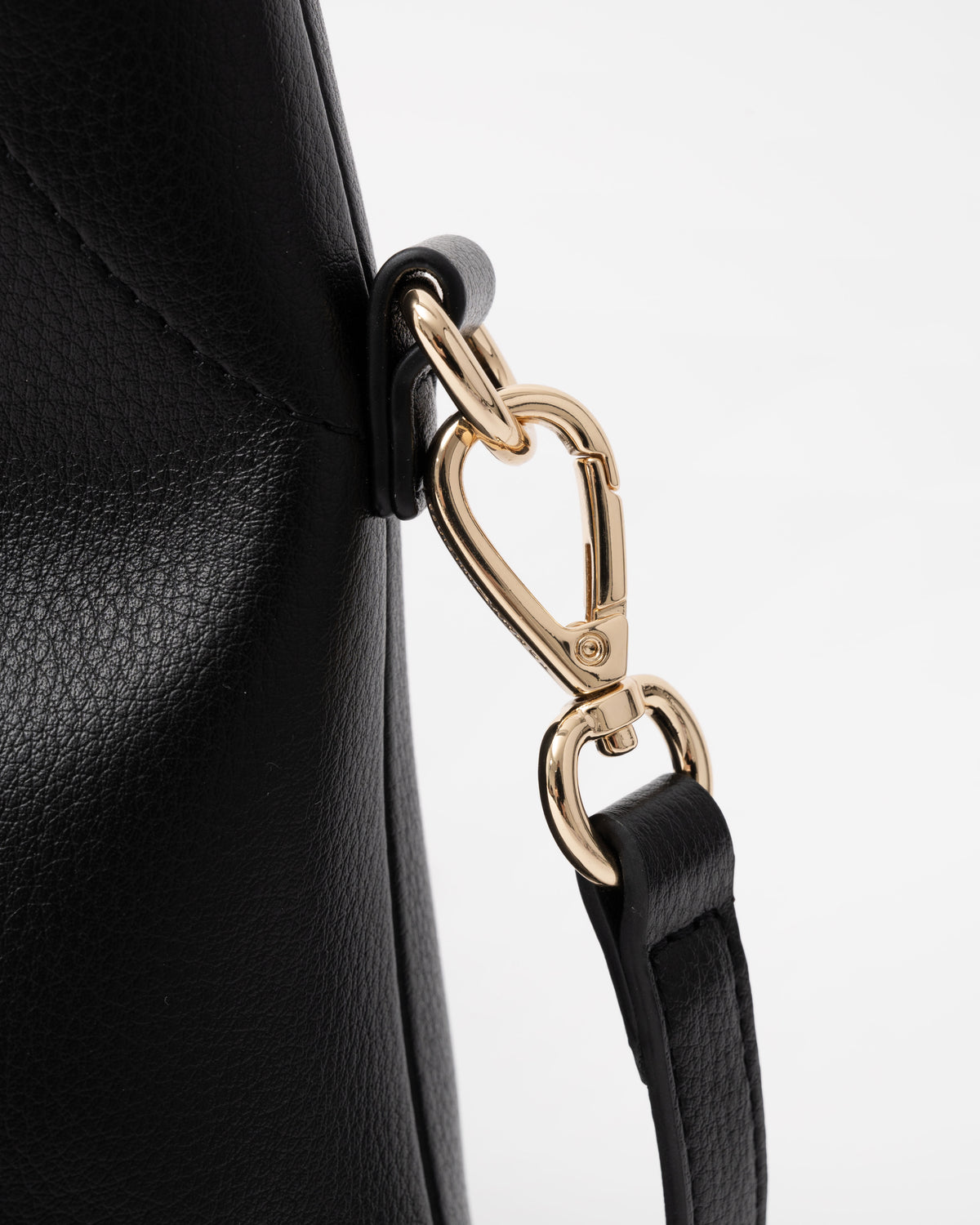 Clasp on the Tommy Hilfiger's TH Everyday Womens Mini Hobo Bag in Black