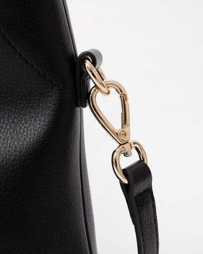 Clasp on the Tommy Hilfiger's TH Everyday Womens Mini Hobo Bag in Black