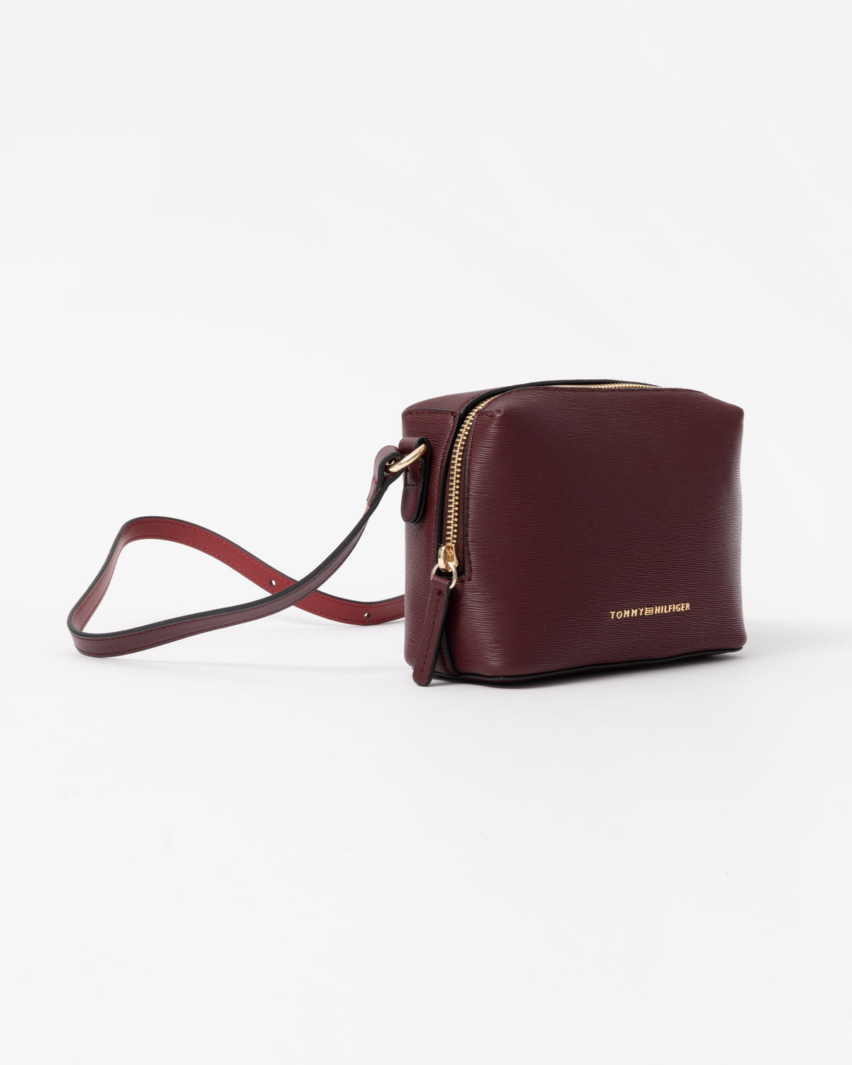 Side of the Tommy Hilfiger TH Modern Womens Camera Bag - Oxblood