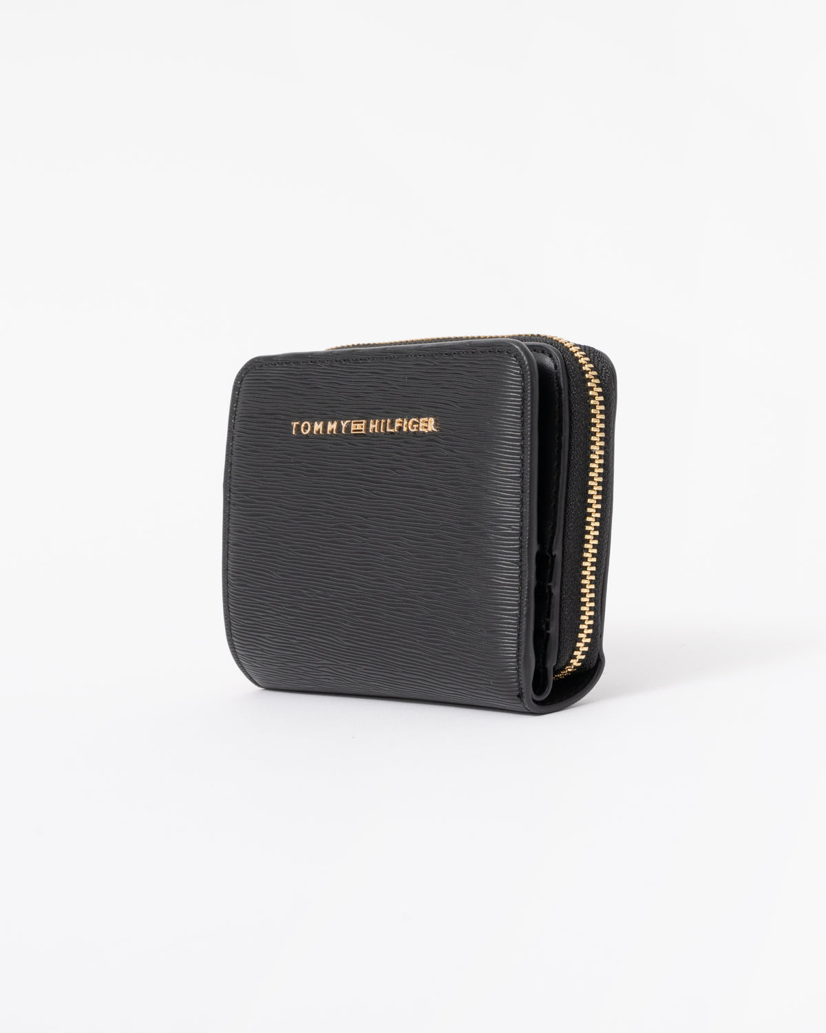 Left side of the Tommy Hilfiger TH Modern Womens Medium Zip Wallet - Black