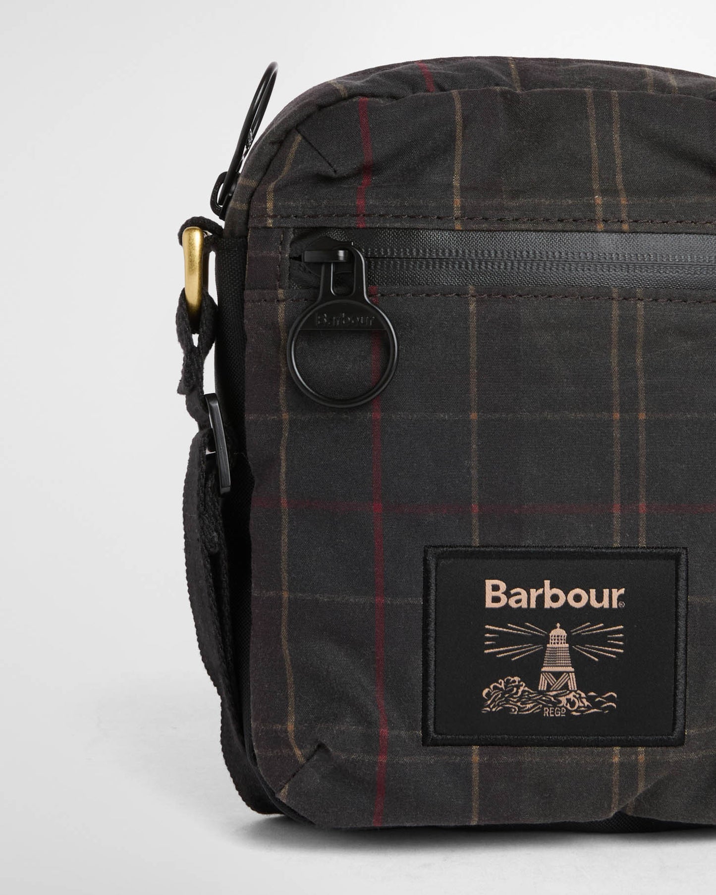 Barbour Field Tartan Wax Crossbody Bag - Dark Classic Tartan, zip/logo detail.