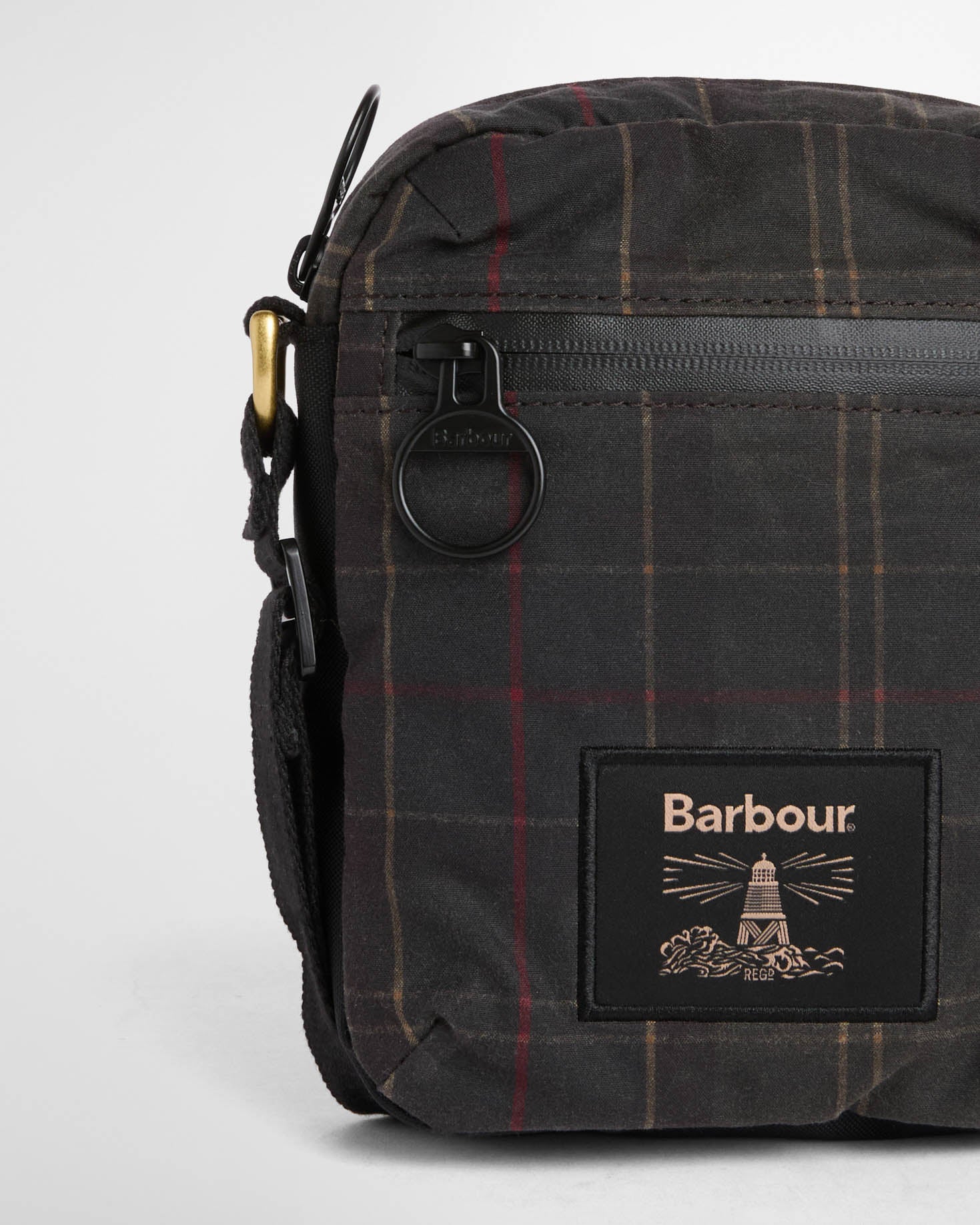 Barbour Field Tartan Wax Crossbody Bag - Dark Classic Tartan, zip/logo detail.