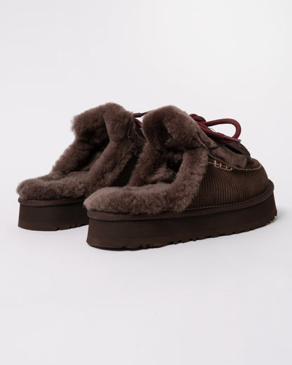 Studio photograph showing back of UGG Womens Disquette Heritage Slippers in Burnt Cedar