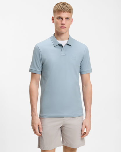 Model wearing BOSS Orange Passenger Mens Stretch-Cotton Slim-Fit Polo Shirt with Logo Patch in Light/Pastel Blue 458 - Front
