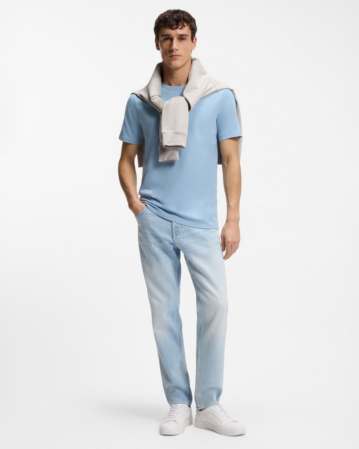 Model wearing BOSS Orange Tales Mens Cotton-Jersey T-shirt With Logo Patch - Light/Pastel Blue 458 - Full length