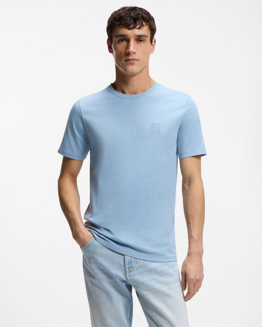 Model wearing BOSS Orange Tales Mens Cotton-Jersey T-shirt With Logo Patch - Light/Pastel Blue 458 - Front