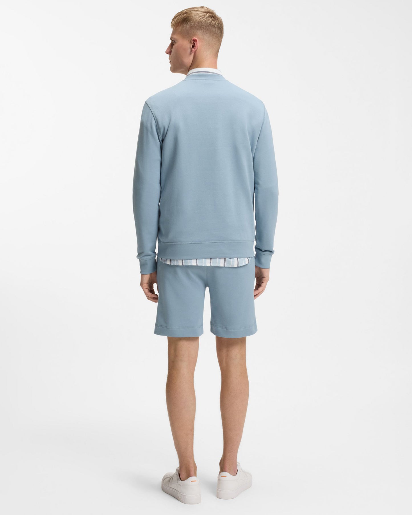 Model wearing BOSS Orange Westart Mens Crew Neck Sweatshirt With Logo Patch in Light/Pastel Blue 458 - Back