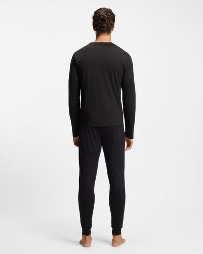 model wearing BOSS Orange Mens Xmas Long Pyjama Gift Set back