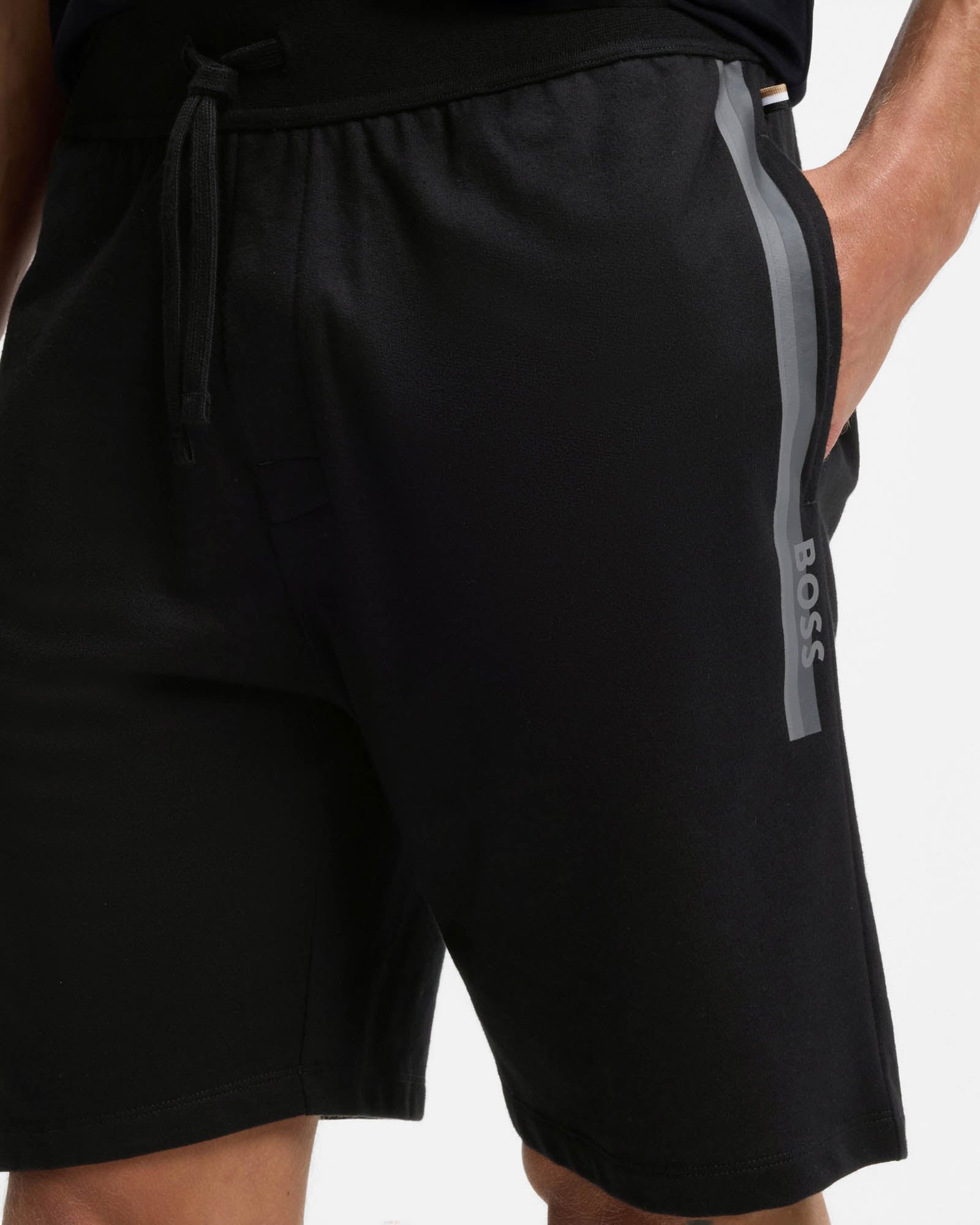 Model Wearing BOSS Orange Authentic Mens Loungewear Shorts with Stripe and Logo in Black 004 - Close up
