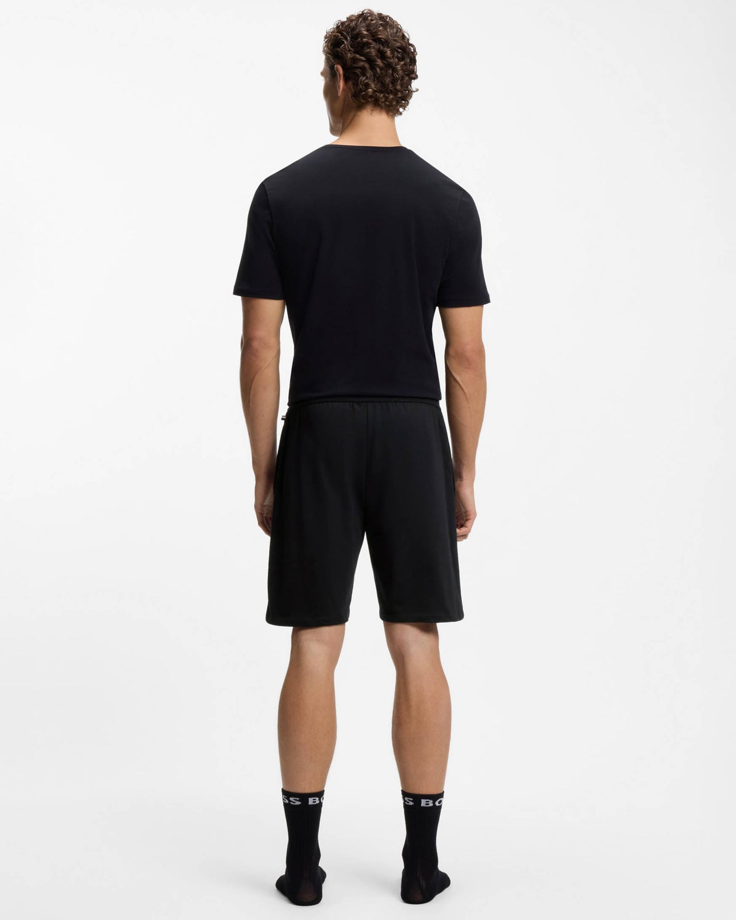 Model Wearing BOSS Orange Authentic Mens Loungewear Shorts with Stripe and Logo in Black 004 - Back