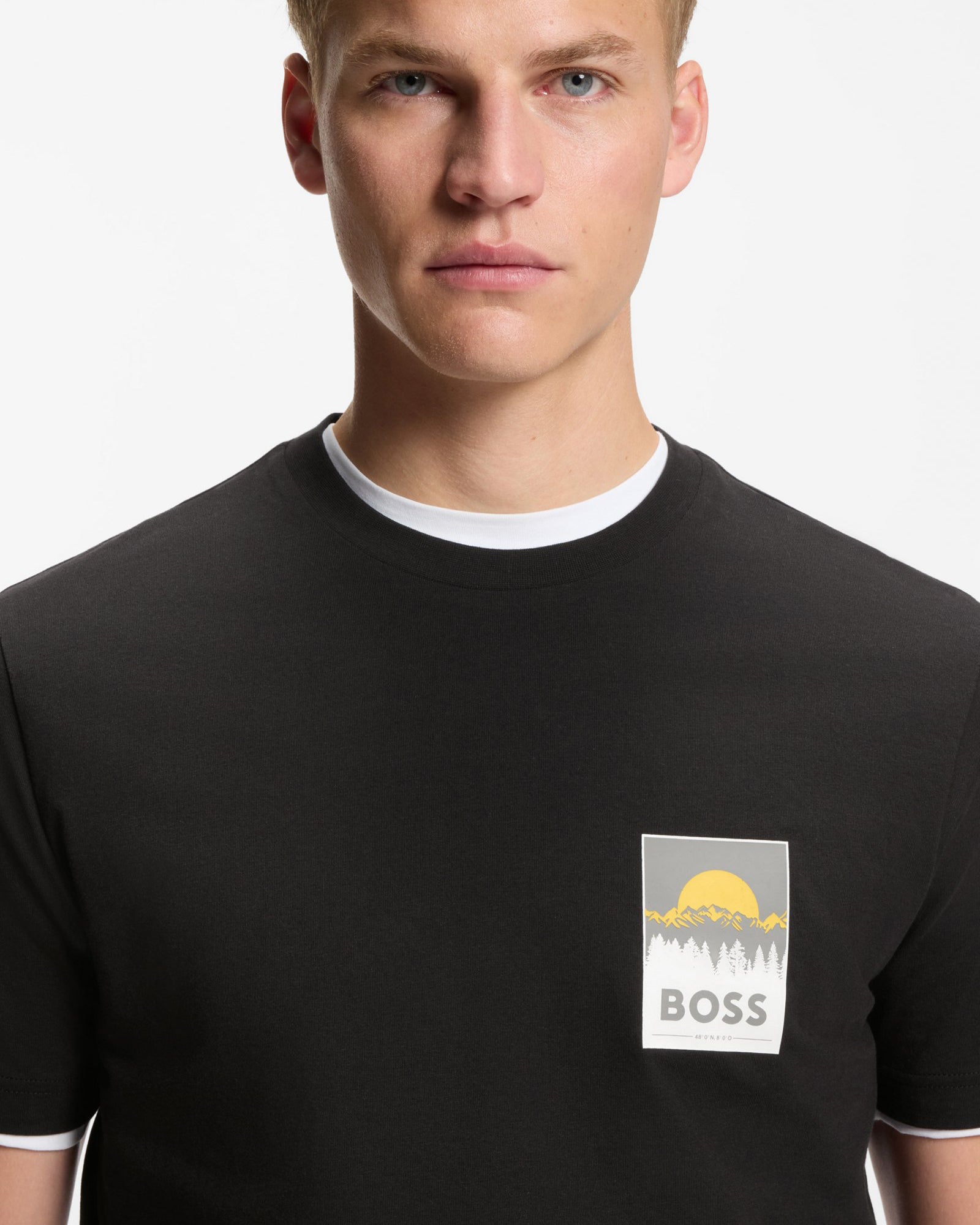 Model wearing BOSS Orange TePlain Mens Cotton-Jersey T-Shirt with Logo Artwork in Black 001 - close up