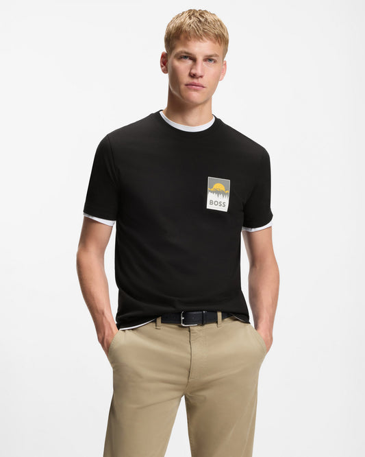 Model wearing BOSS Orange TePlain Mens Cotton-Jersey T-Shirt with Logo Artwork in Black 001 - Front
