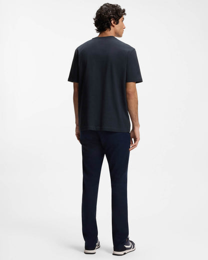 Model wearing BOSS Orange Te Board Mens T-Shirt in Dark Blue 404 - Back