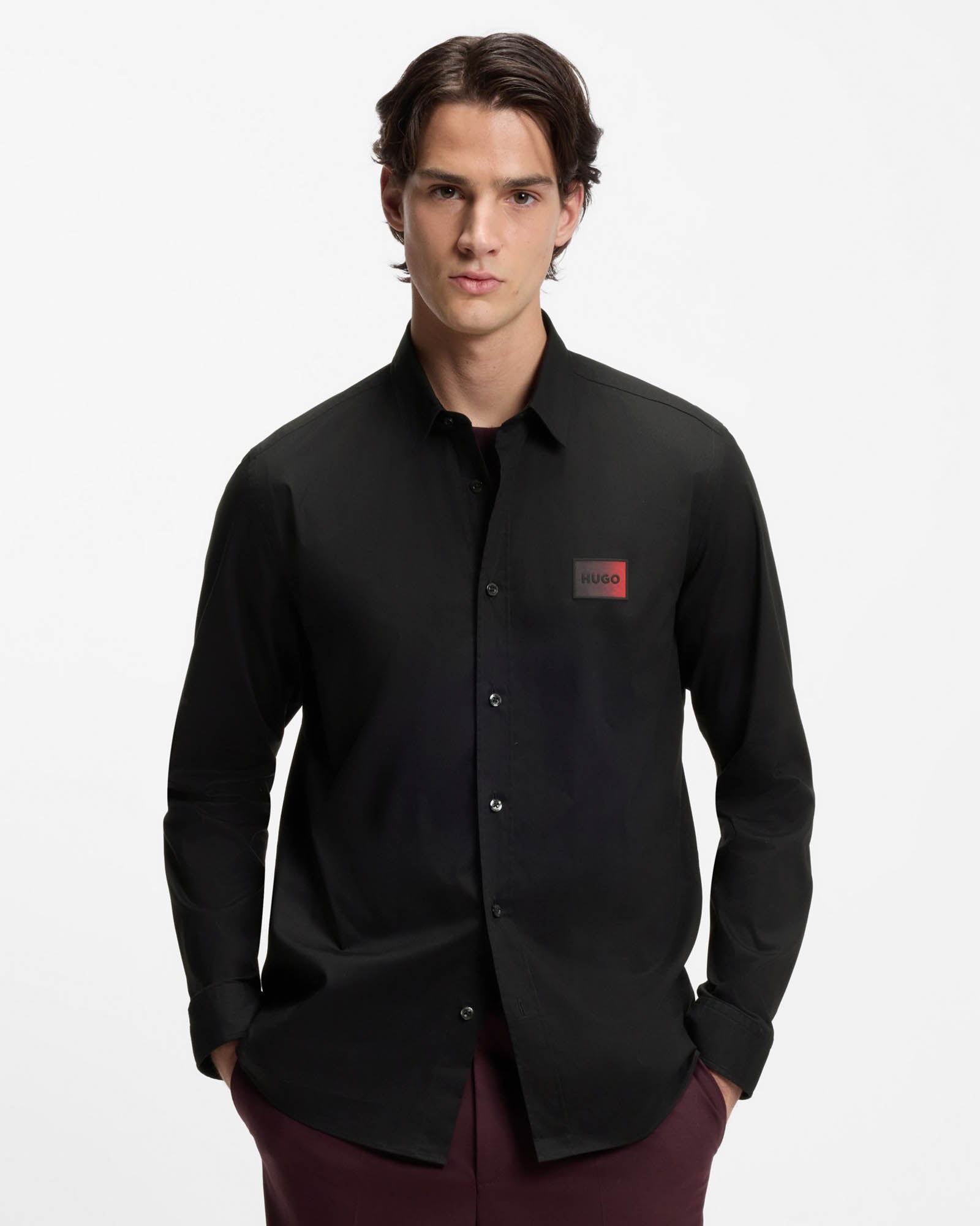 Model wearing HUGO Mens Emero Mens Relaxed-Fit Shirt in Stretch-Cotton Canvas in Black 001 - Front
